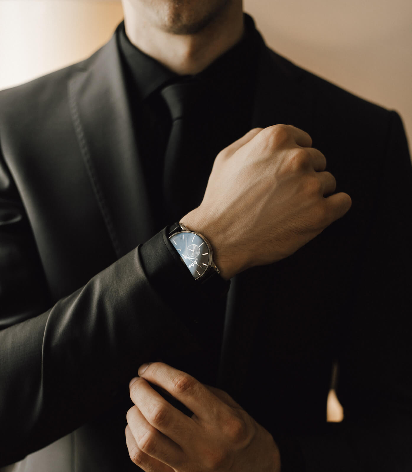 man with a watch on his wrist